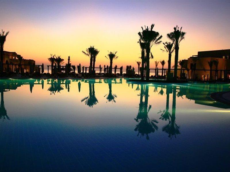 Miramar Al Aqah Beach Resort Extérieur photo Sunset at the resort