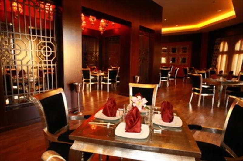 Miramar Al Aqah Beach Resort Extérieur photo Interior of the restaurant