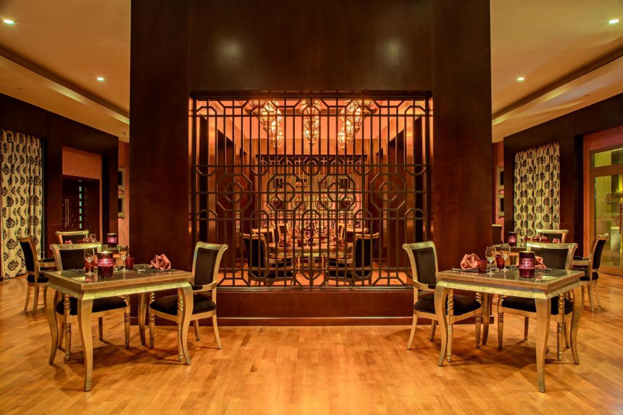 Miramar Al Aqah Beach Resort Extérieur photo The restaurant at the Taj Mahal Palace